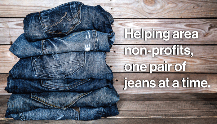 Folded denim that reads: Helping area, non-profits, one pair of jeans at a time.